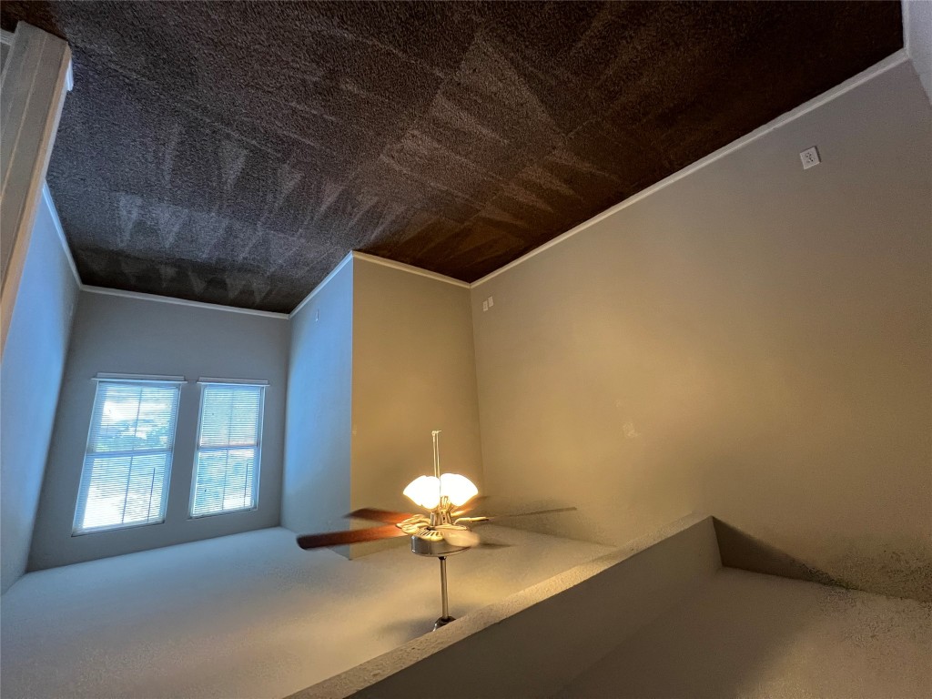 2529 Rio Grande Street, Unit 47 Austin, TX 78705 - Photo 10 of 11 wooden floor in an empty room with a window