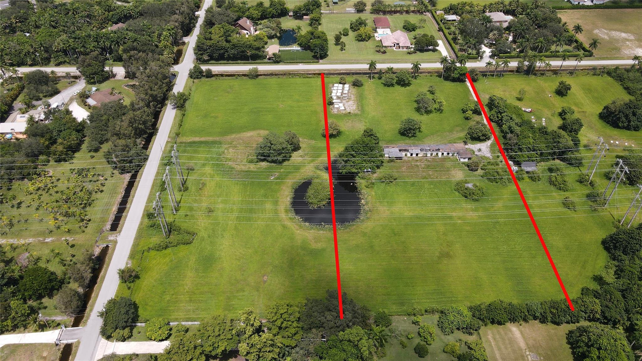 12850 Luray Road Southwest Ranches, FL 33330 - Photo 2 of 2 an aerial view of residential houses with outdoor space