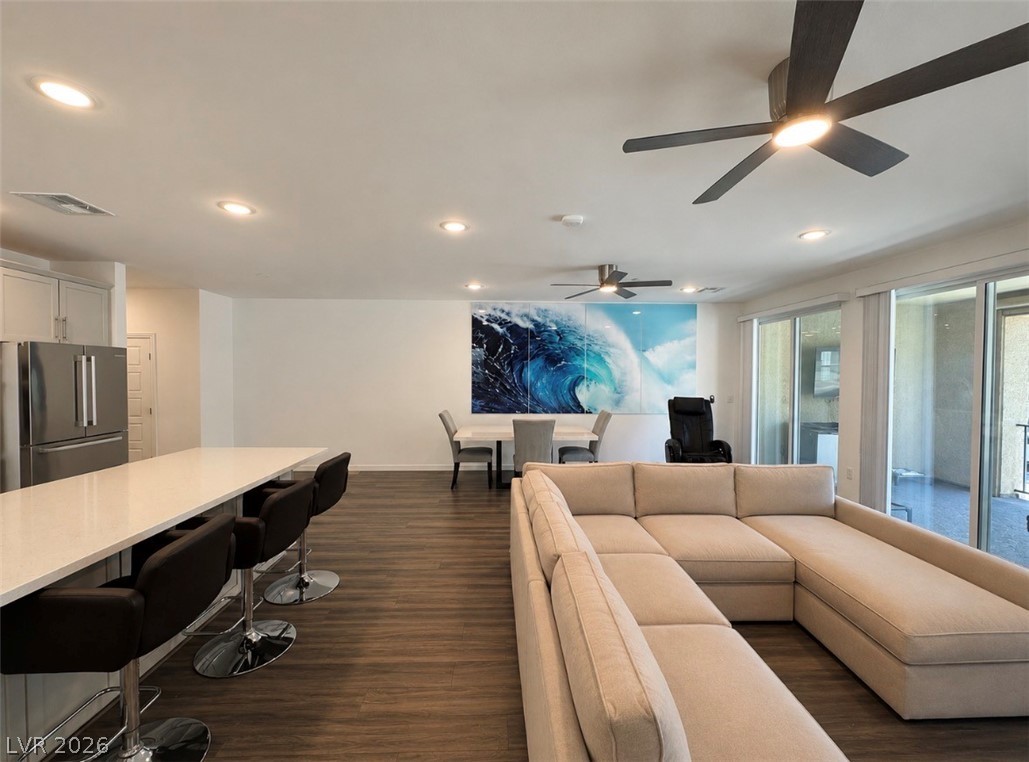 2555 Hampton Road, Unit 4205 Henderson, NV 89052 - Photo 10 of 52 An inviting open concept living area features seamless transitions and abundant natural light.