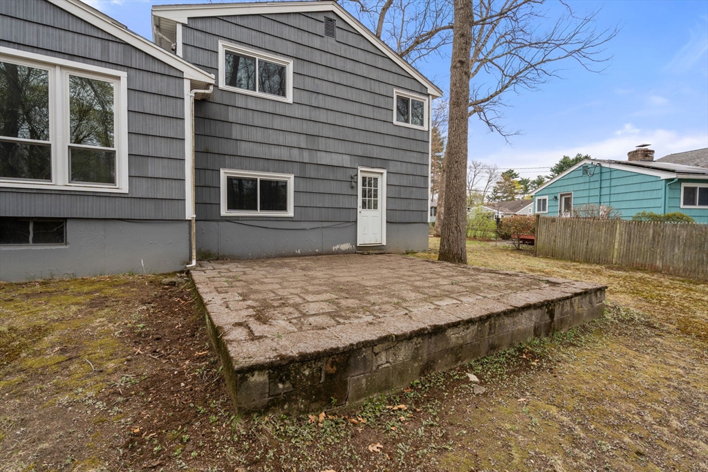 18 Royce Road Framingham, MA 01701 - Photo 29 of 30 a view of a house with backyard
