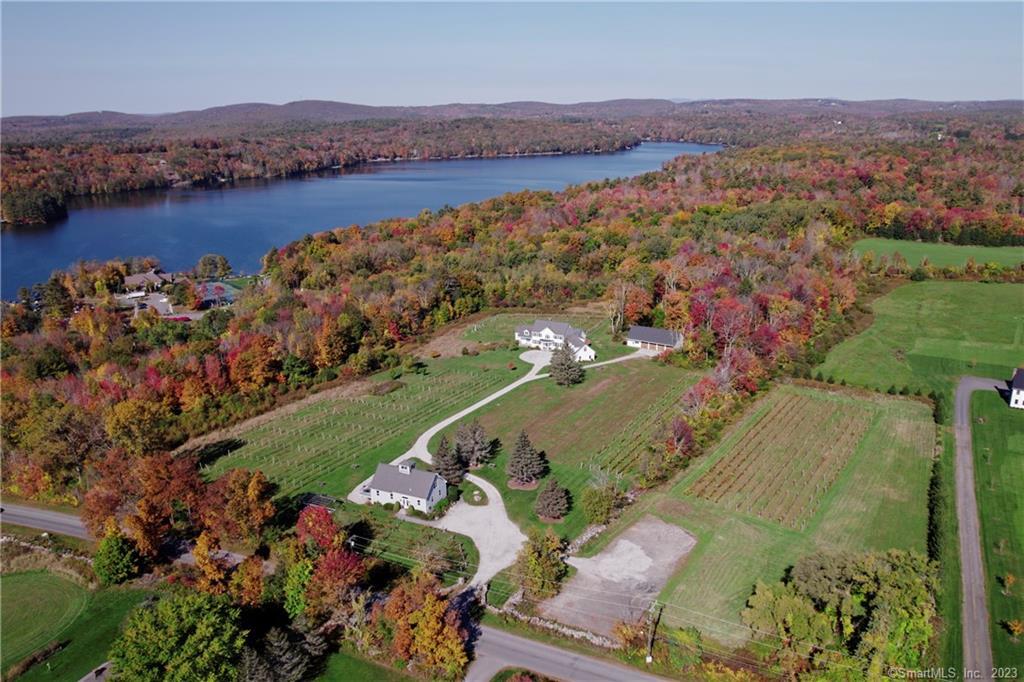 42 Ives Road Goshen, CT 06756 - Photo 1 of 1 an aerial view of a city with mountains