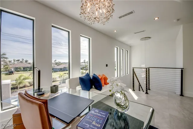 a view of a dining room with furniture window and outside view