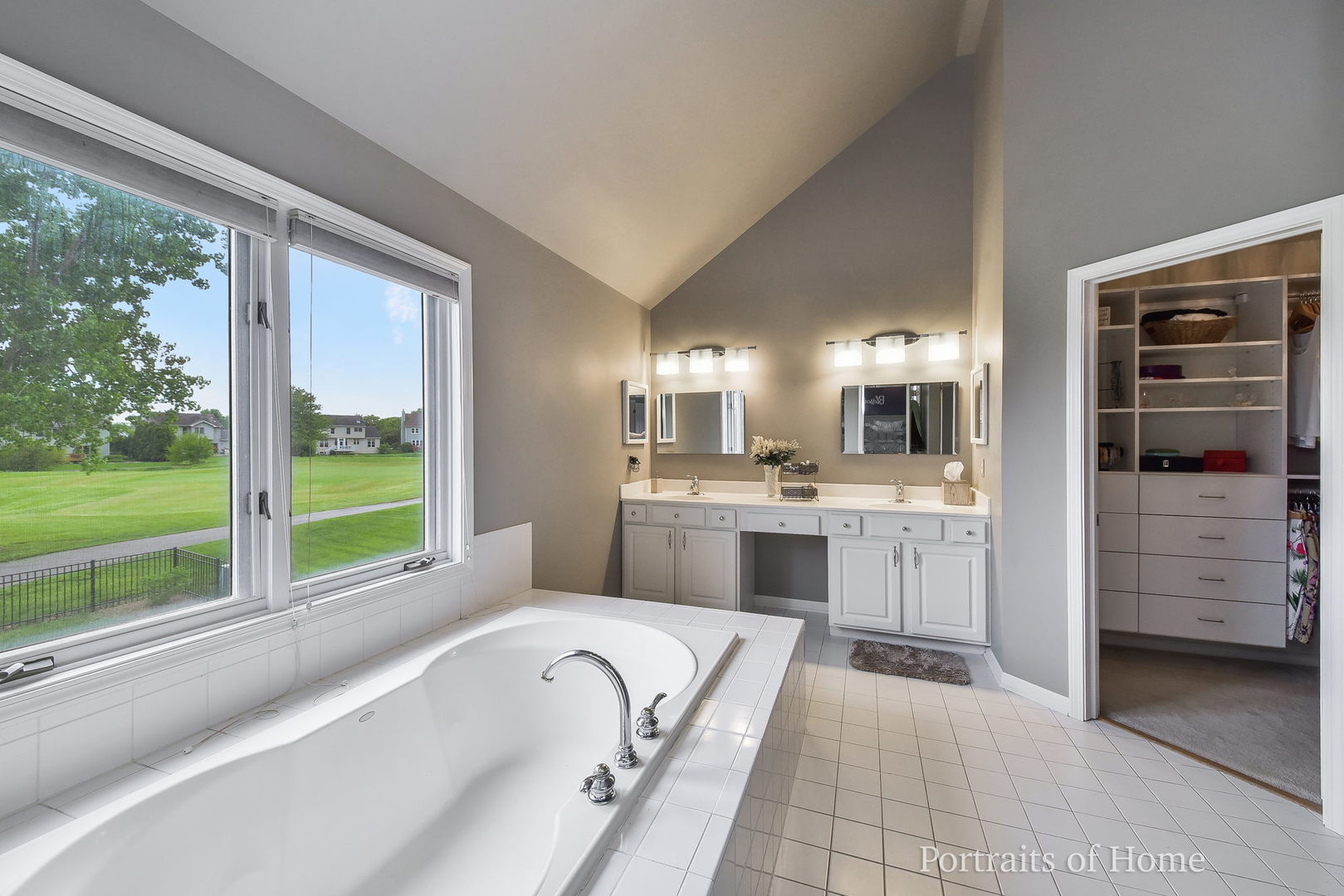 39W143 Bartelt Road Geneva, IL 60134 - Photo 11 of 21 a bathroom with a tub sink and mirror