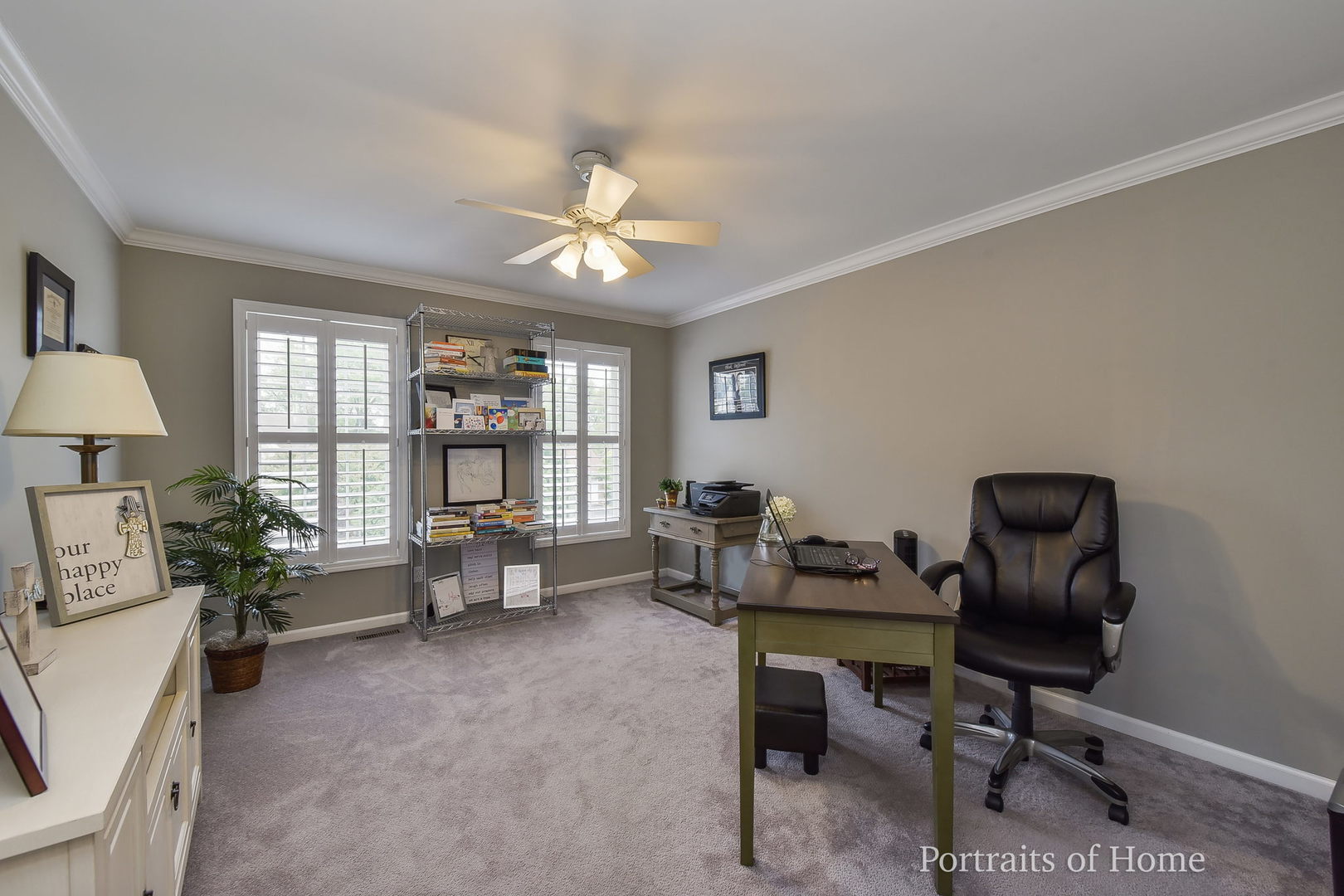 39W143 Bartelt Road Geneva, IL 60134 - Photo 14 of 21 a view of a workspace with furniture and a window