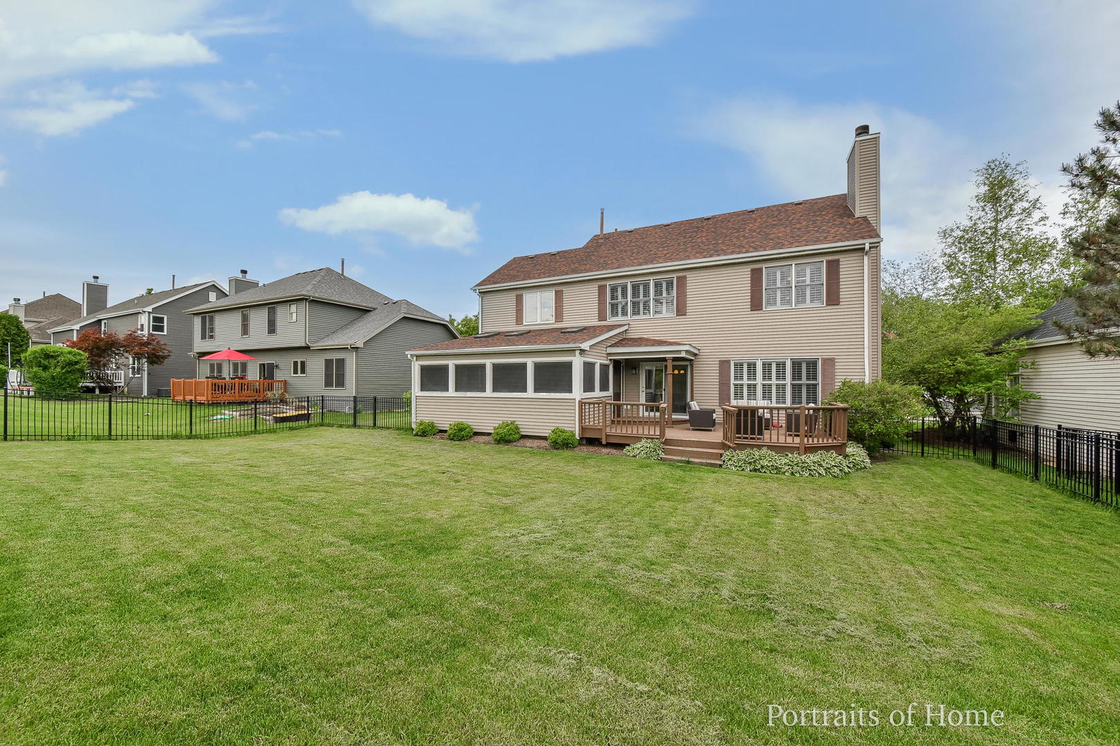 39W143 Bartelt Road Geneva, IL 60134 - Photo 20 of 21 a view of a house with a big yard