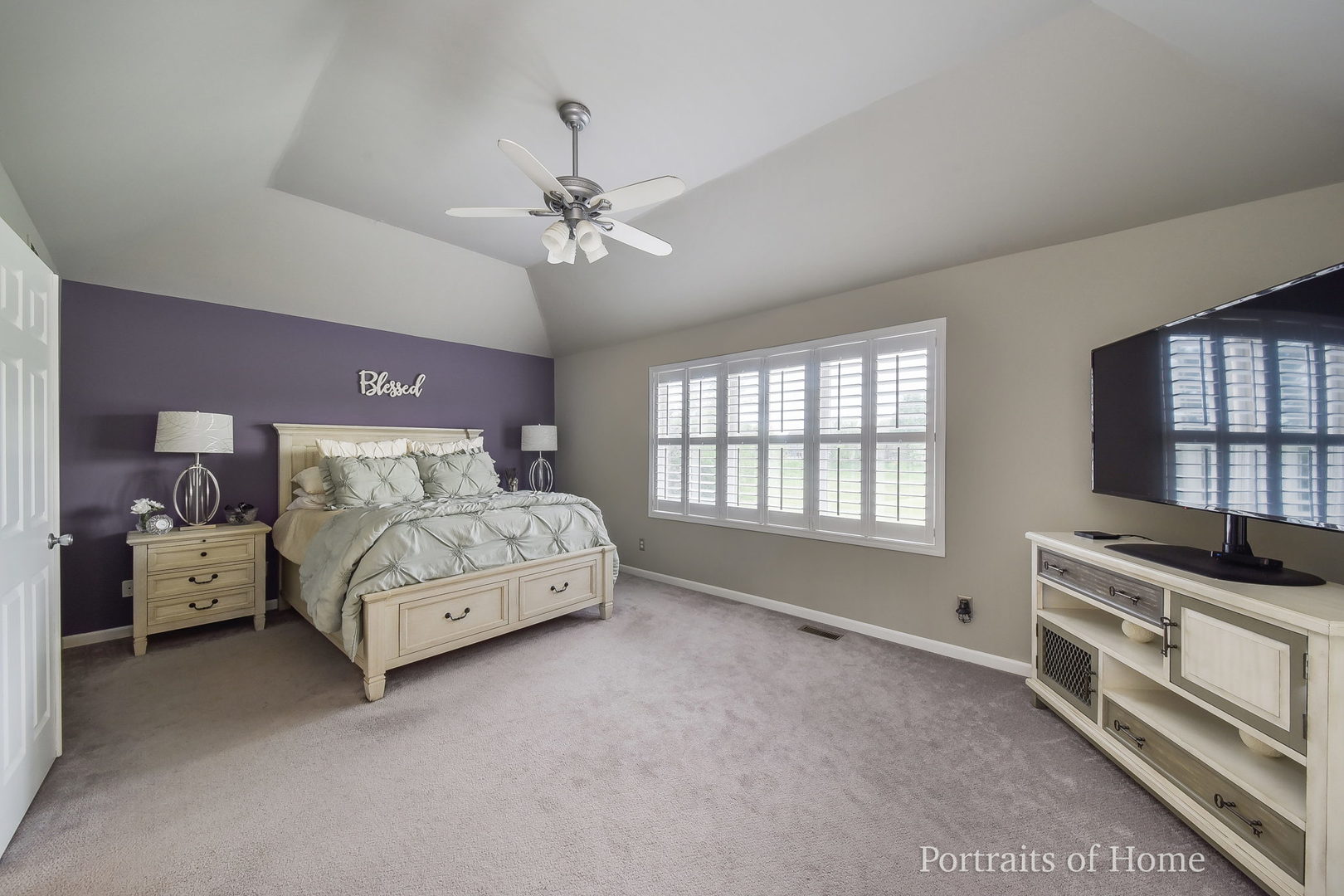 39W143 Bartelt Road Geneva, IL 60134 - Photo 10 of 21 a bedroom with a bed and a chandelier