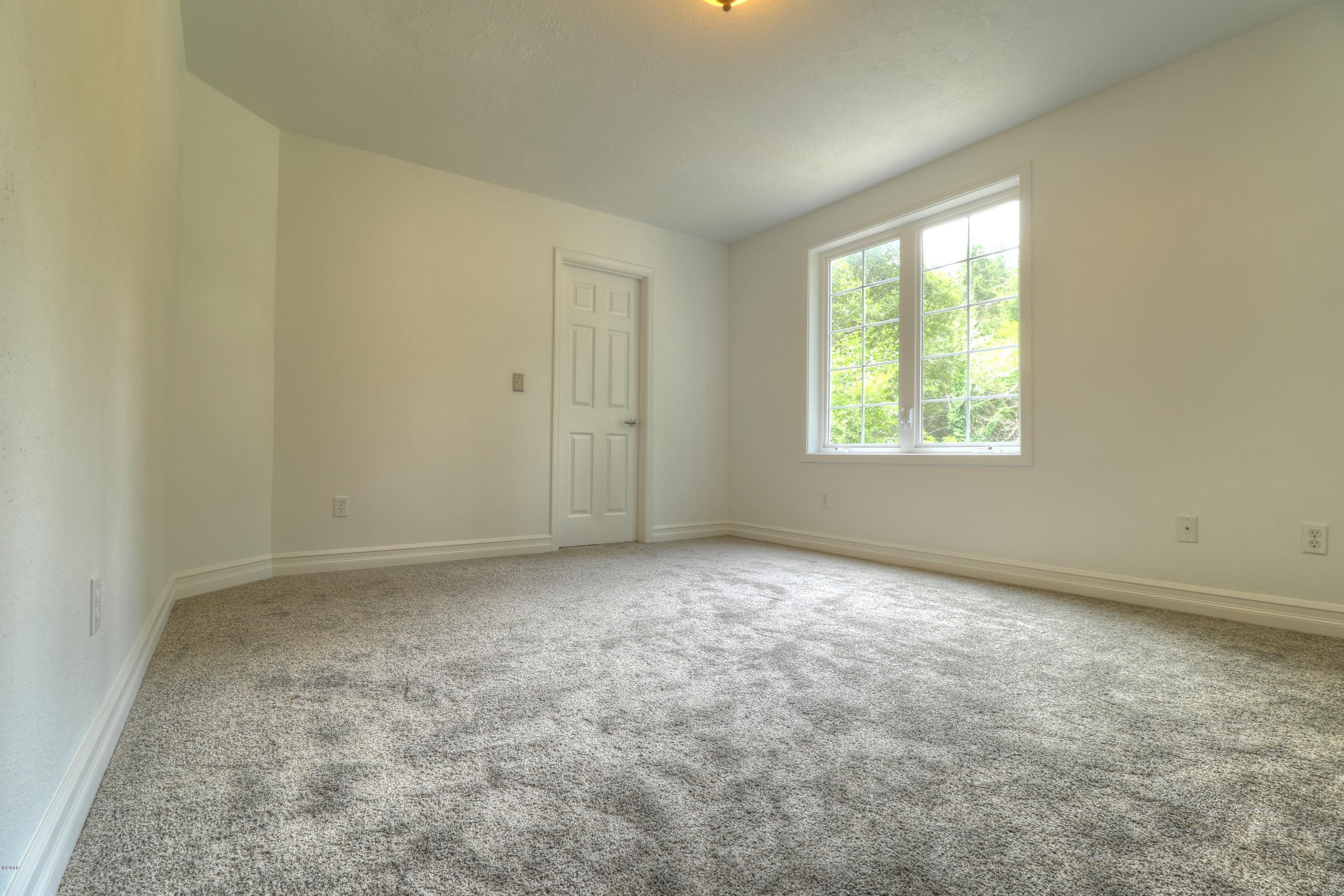 9775 Southeast Cedar Street South Beach, OR 97366 - Photo 25 of 33 Bedroom 2a