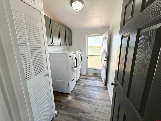 a view of a storage in a room with a door