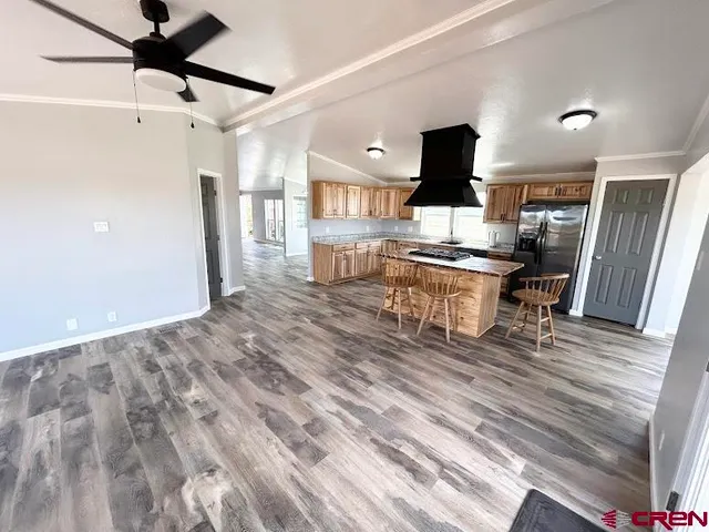 a living room with a couch and a rug