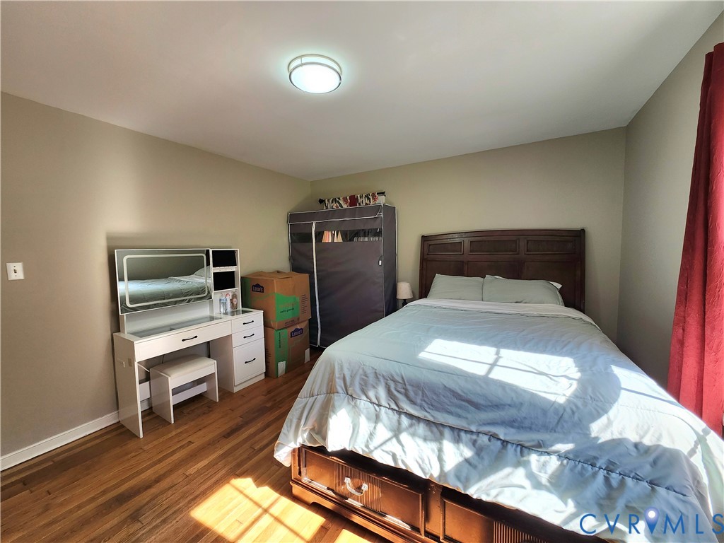 2718 Stacie Road Richmond, VA 23224 - Photo 31 of 50 Bedroom featuring wood-finish flooring, a contempo