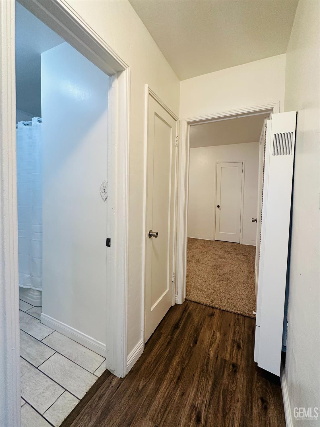 Undisclosed Address Bakersfield, CA 93308 - Photo 15 of 28 a view of hallway with wooden floor