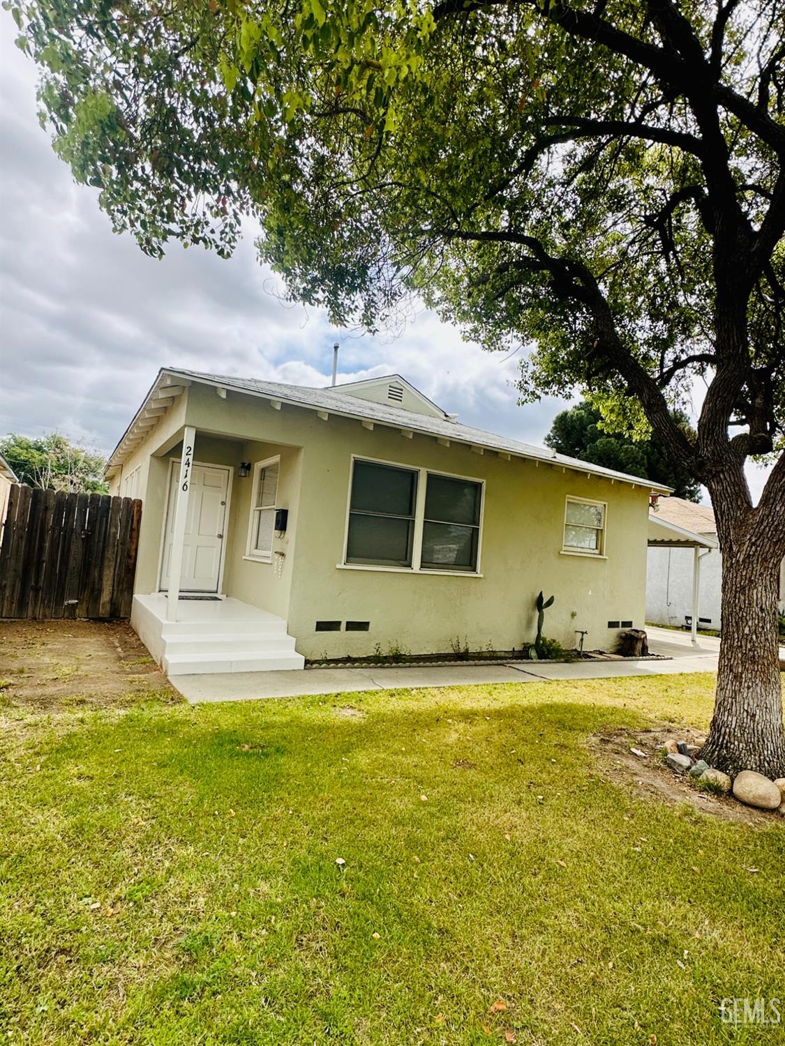 Undisclosed Address Bakersfield, CA 93308 - Photo 25 of 28 a view of a house with a swimming pool