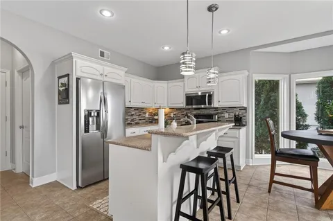 $425,000 | 906 Northwest Magnolia Lane, Grain Valley, MO 64029