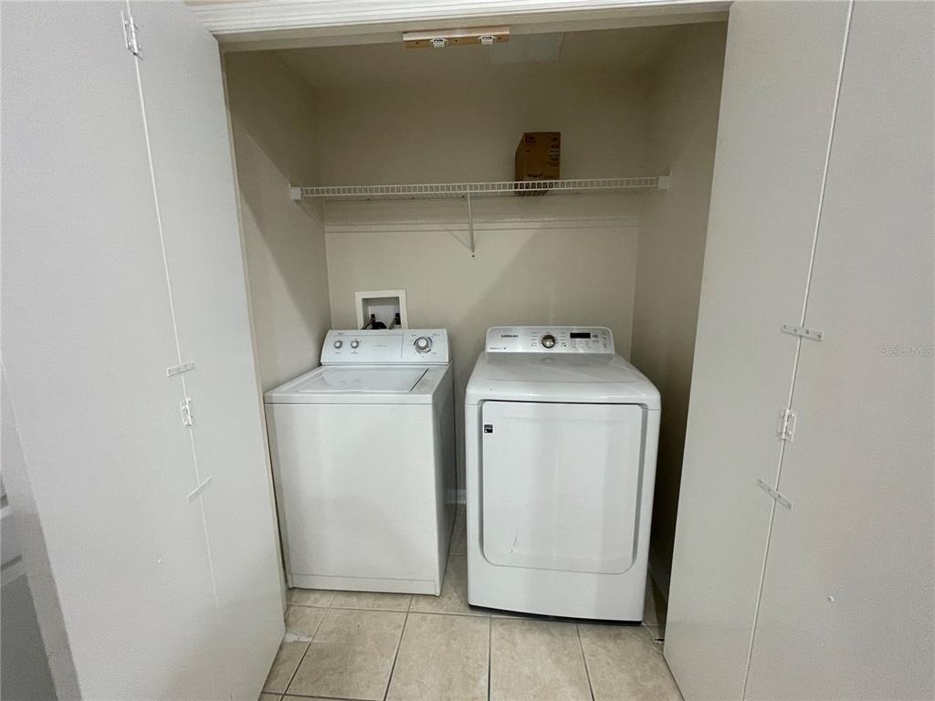 1228 Bensbrooke Drive Wesley Chapel, FL 33543 - Photo 20 of 37 a utility room with dryer and washer