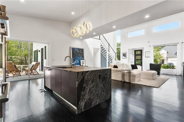 a kitchen with counter top space cabinets and stainless steel appliances