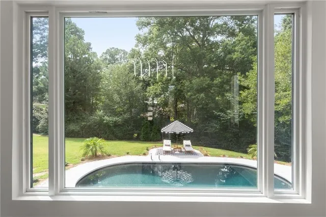 a bathroom with bathtub and a sink