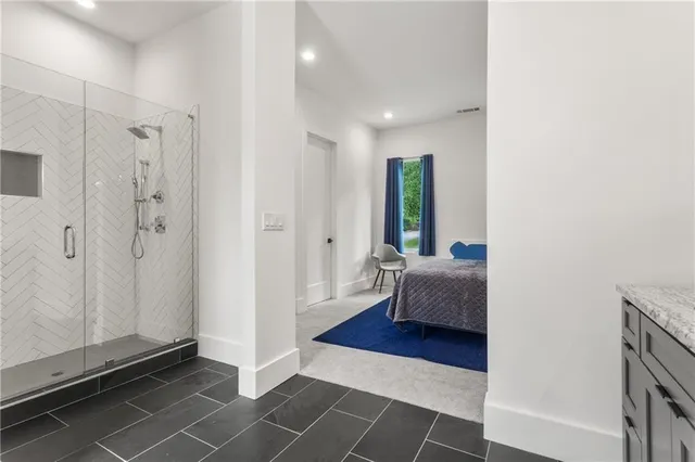 a view of a swimming pool with a outdoor seating