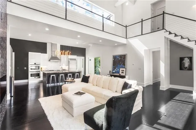 a view of a swimming pool in a backyard