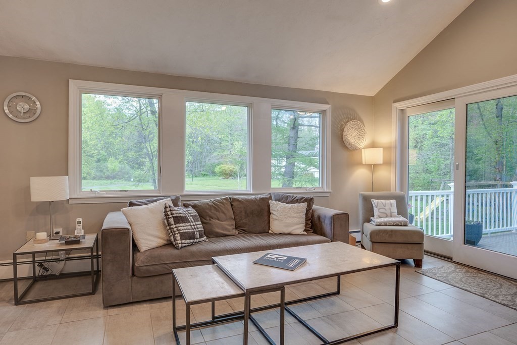 1 Radcliffe Circle Bedford, MA 01730 - Photo 12 of 42 a living room with furniture and a large window