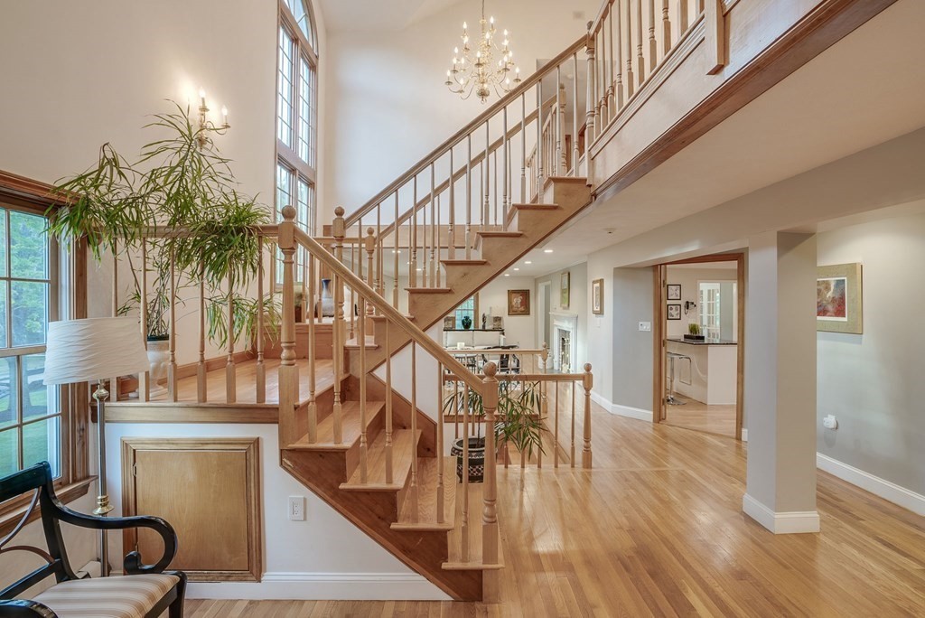 1 Radcliffe Circle Bedford, MA 01730 - Photo 18 of 42 a view of entryway and hall with wooden floor