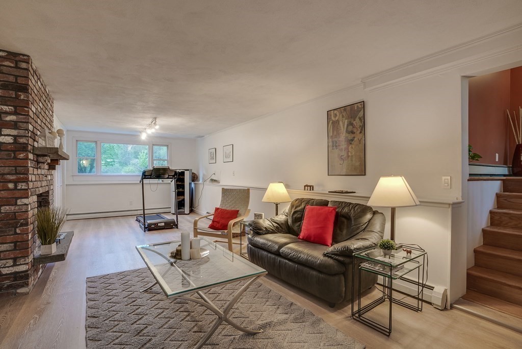 1 Radcliffe Circle Bedford, MA 01730 - Photo 25 of 42 a living room with furniture and wooden floor
