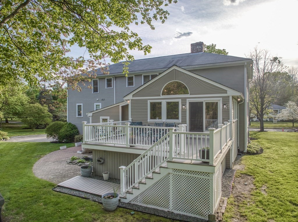 1 Radcliffe Circle Bedford, MA 01730 - Photo 32 of 42 a front view of a house with a yard