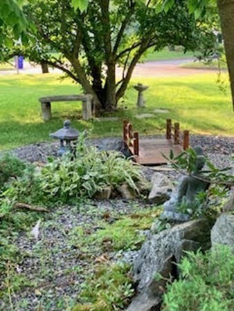 1 Radcliffe Circle Bedford, MA 01730 - Photo 39 of 42 a view of a garden with an outdoor space