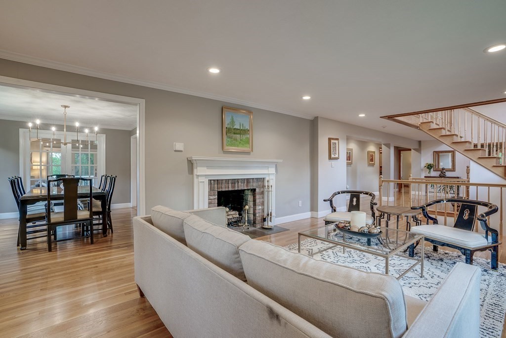1 Radcliffe Circle Bedford, MA 01730 - Photo 7 of 42 a living room with furniture and a fireplace