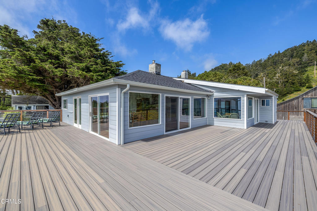 1990 Highway 1 Albion, CA 95410 - Photo 16 of 57 a view of a house with a yard