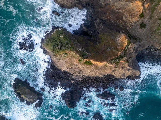 a view of a lake with mountains in the background