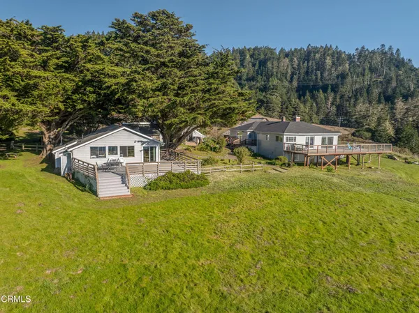 a kitchen with a stove and a refrigerator