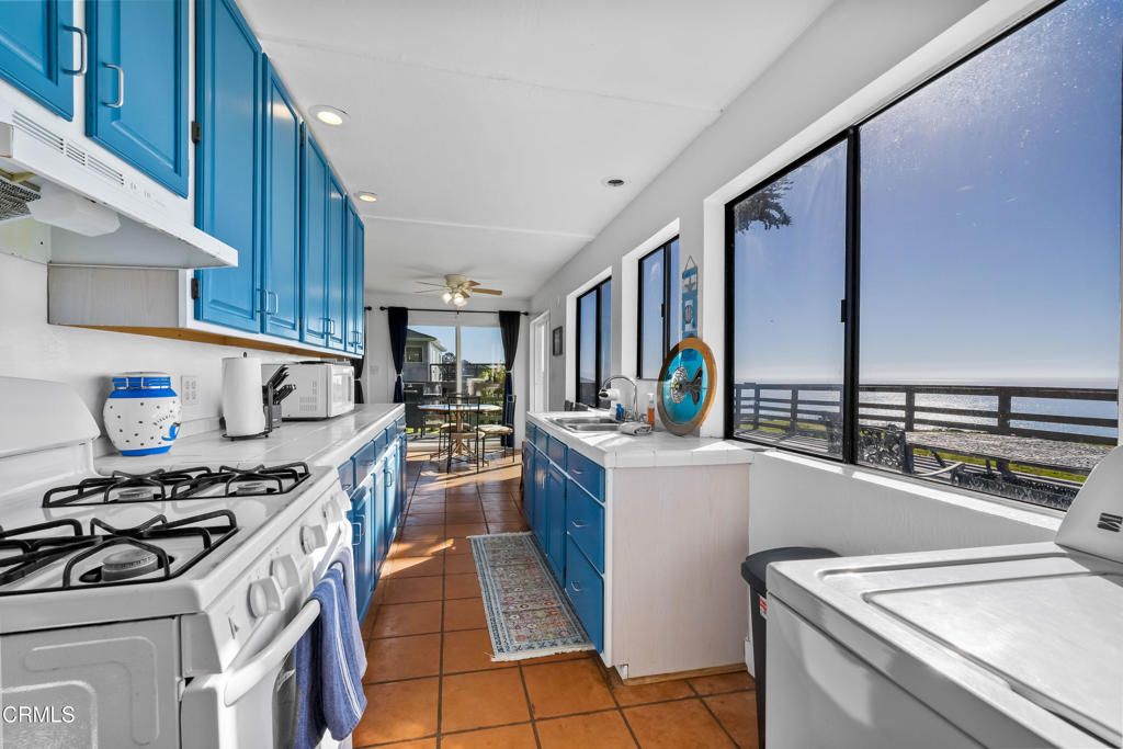 1990 Highway 1 Albion, CA 95410 - Photo 37 of 57 a kitchen with a stove and a refrigerator