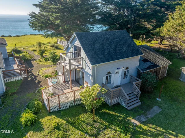 a view of a house with swimming pool