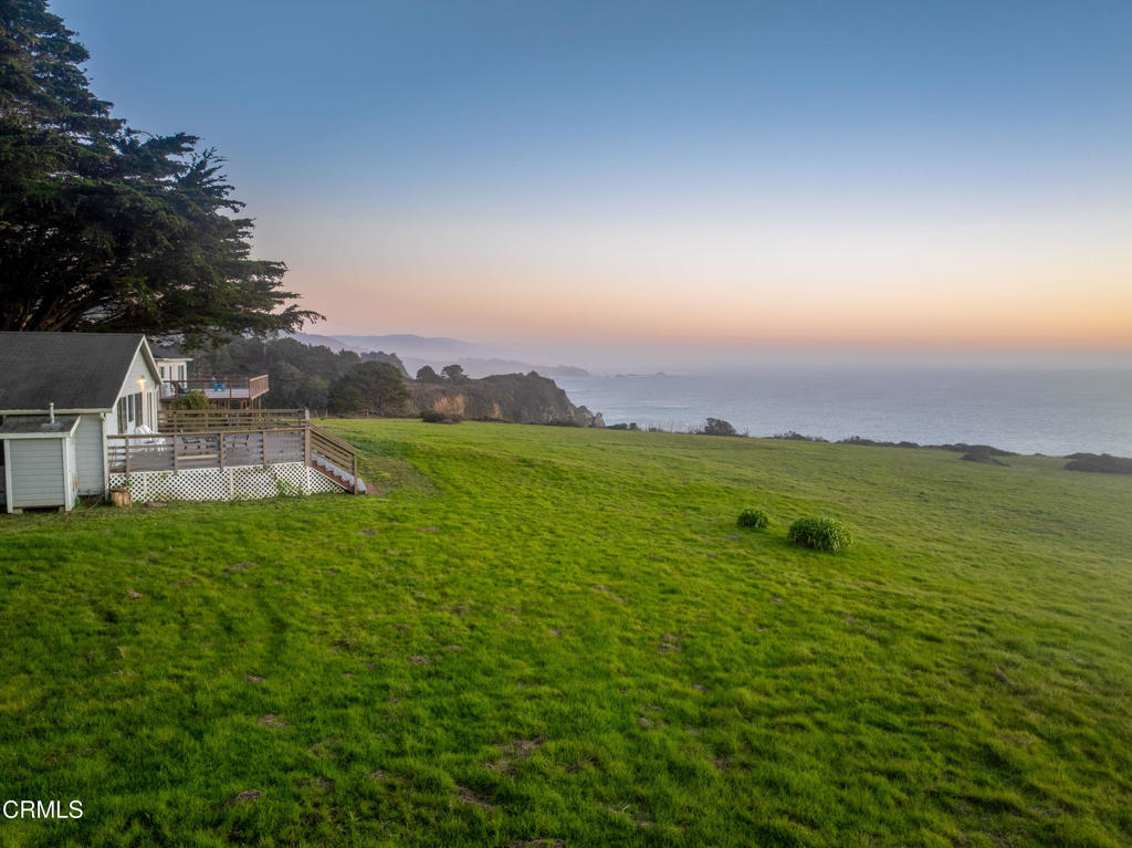 1990 Highway 1 Albion, CA 95410 - Photo 8 of 57 an aerial view of residential houses with outdoor space and trees