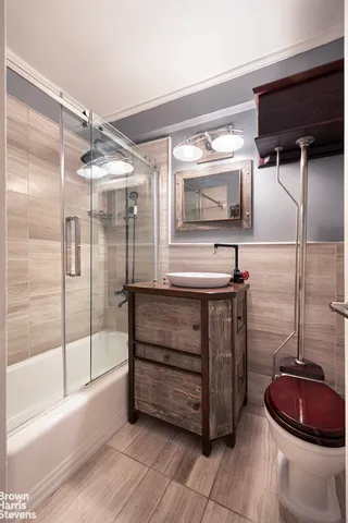 a kitchen with stainless steel appliances a refrigerator and a stove