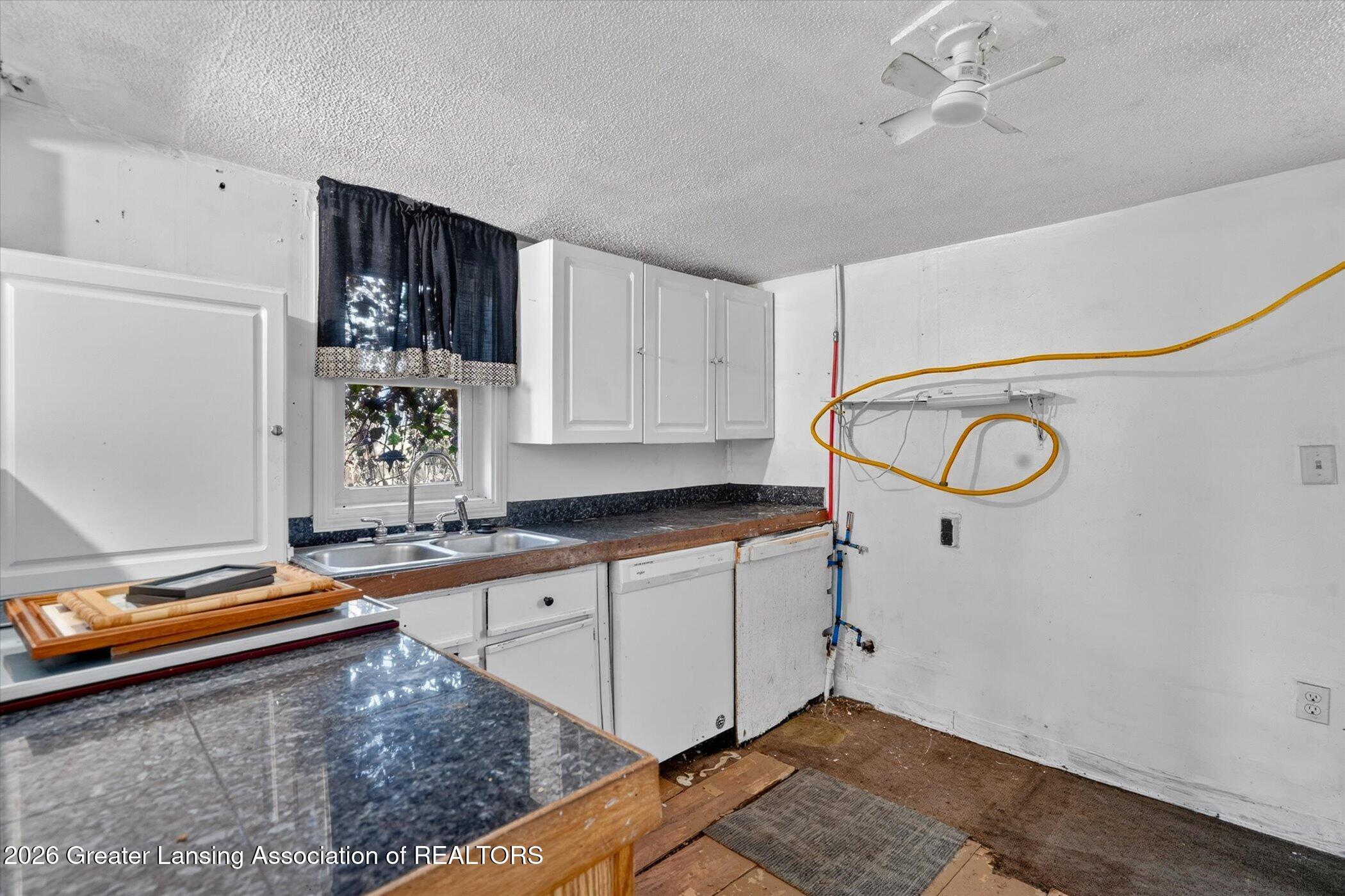 3024 West Jolly Road Lansing, MI 48911 - Photo 11 of 37 12-3024-W-Jolly-Rd-WindowStill-Real-Esta