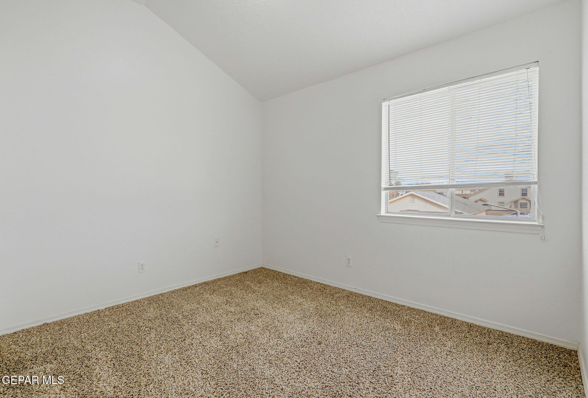 3424 Tierra Cromo Road El Paso, TX 79938 - Photo 21 of 27 an empty room with a window