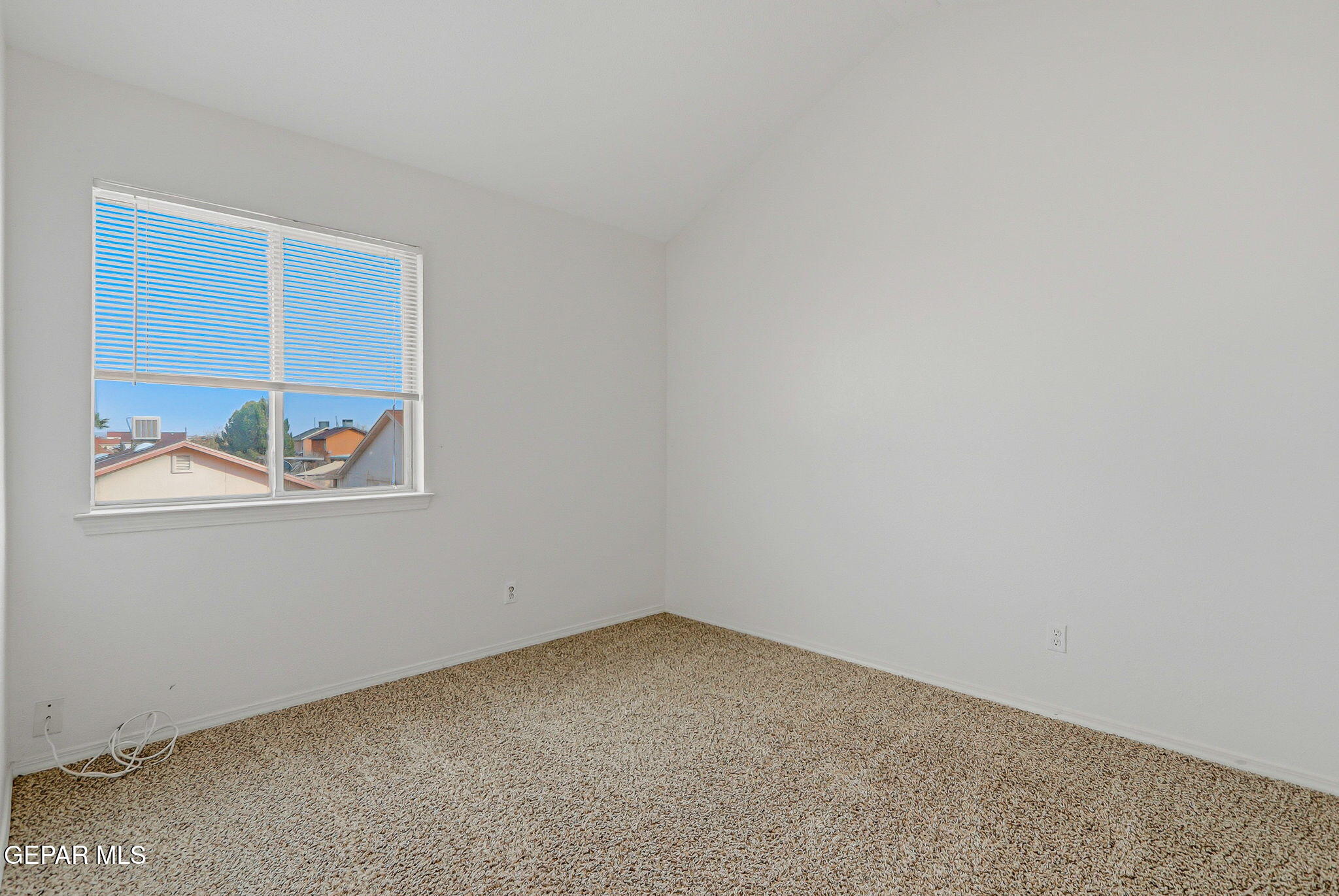 3424 Tierra Cromo Road El Paso, TX 79938 - Photo 23 of 27 an empty room with windows