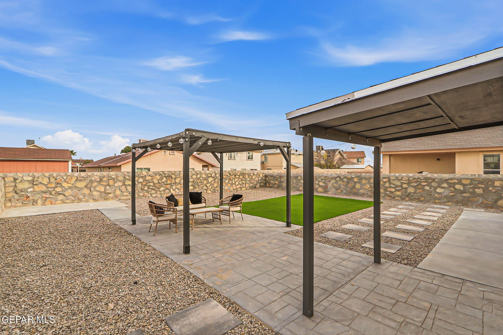 3424 Tierra Cromo Road El Paso, TX 79938 - Photo 25 of 27 a view of a swimming pool with a patio