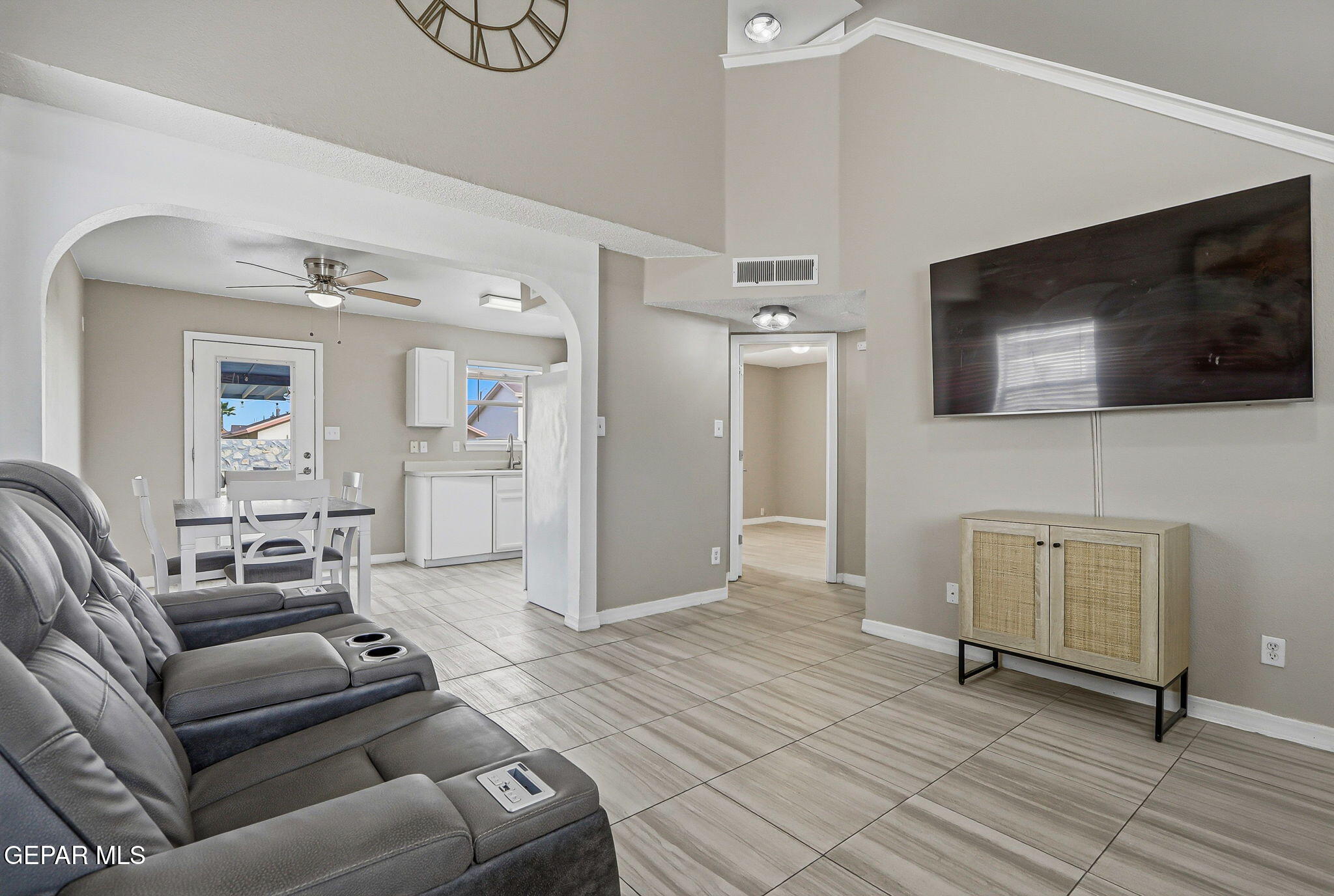 3424 Tierra Cromo Road El Paso, TX 79938 - Photo 5 of 27 a living room with furniture and a flat screen tv