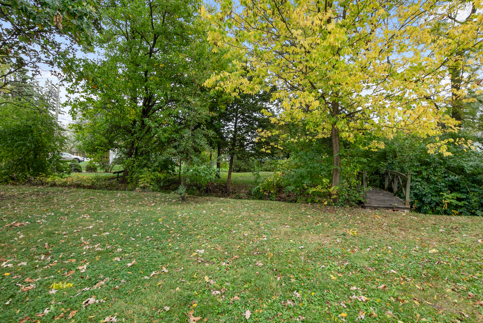 701 East 7th Street Lockport, IL 60441 - Photo 28 of 29 a view of a green field with trees in the background