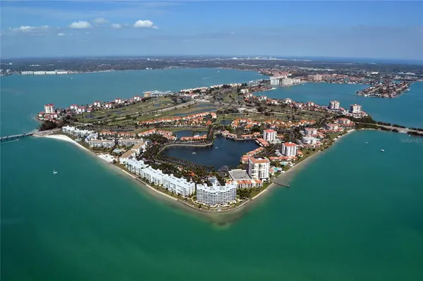 a view of a lake with a city