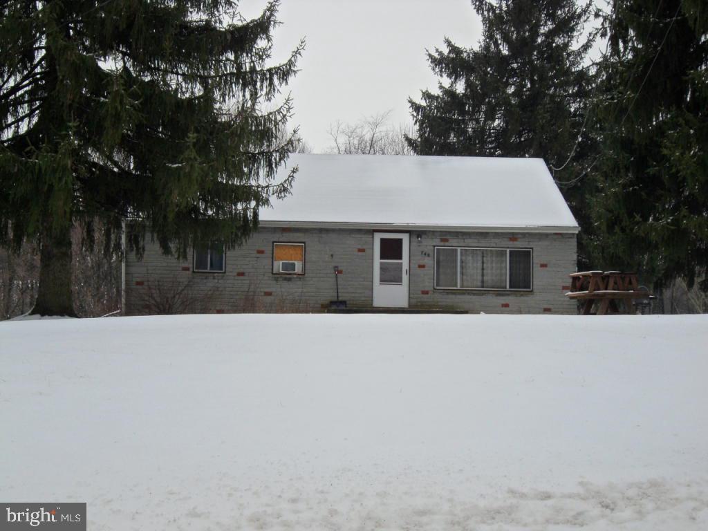 748 Hopeland Road Lititz, PA 17543 - Photo 1 of 26 a house with trees in front of it