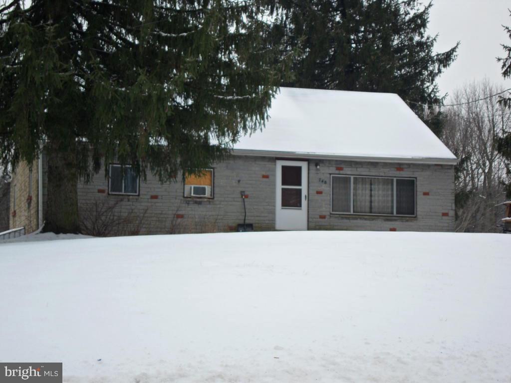 748 Hopeland Road Lititz, PA 17543 - Photo 3 of 26 a front view of a house with a yard