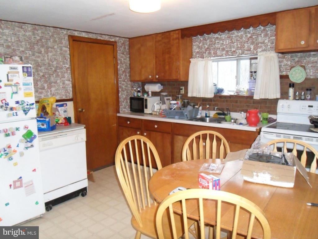 748 Hopeland Road Lititz, PA 17543 - Photo 8 of 26 a bedroom with furniture a window and dresser