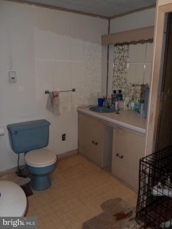 748 Hopeland Road Lititz, PA 17543 - Photo 10 of 26 a bathroom with a toilet sink and mirror
