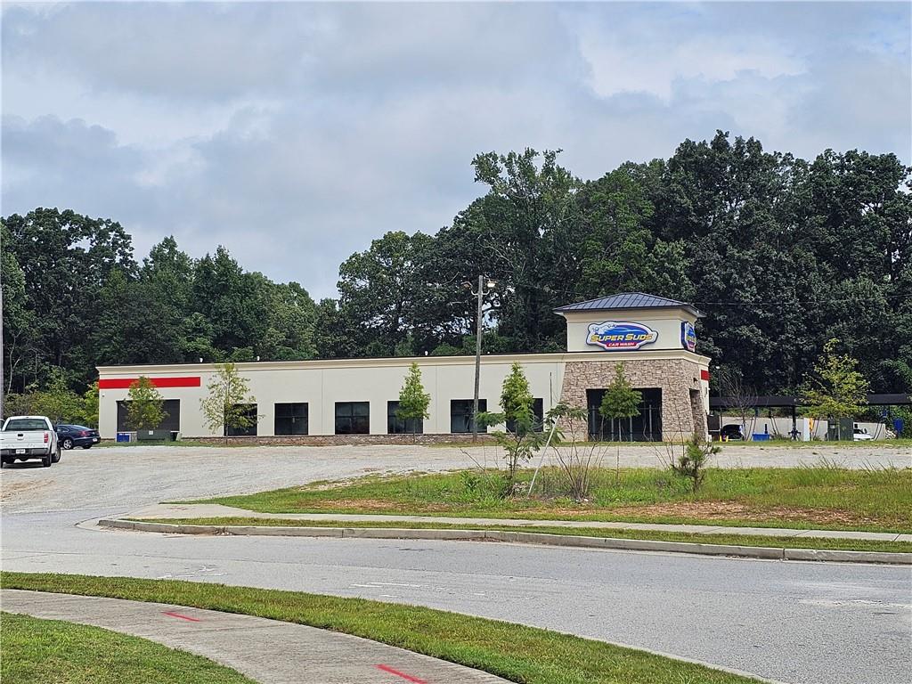 2551 Panola Road Decatur, GA 30035 - Photo 10 of 12 a view of a town with barn and large trees
