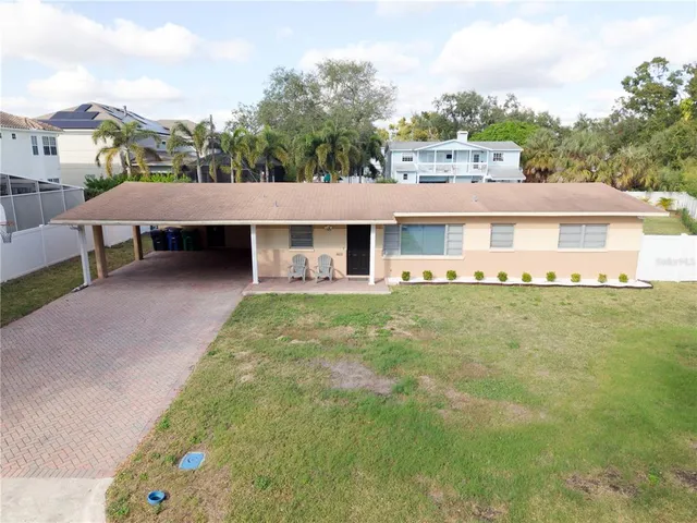 a view of a lake with big yard