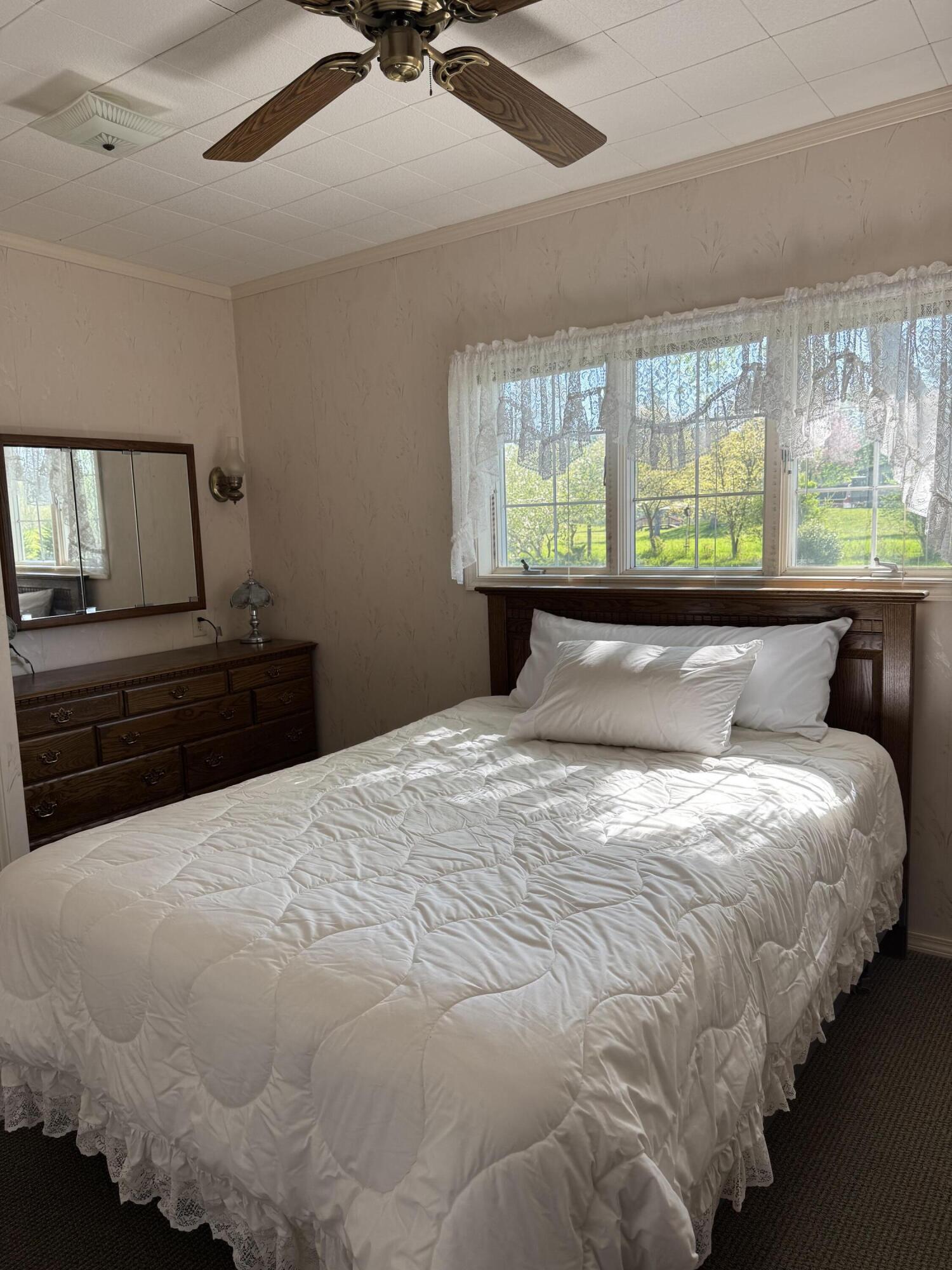 220 East Preuss Road Manistee, MI 49660 - Photo 9 of 28 Primary Bedroom