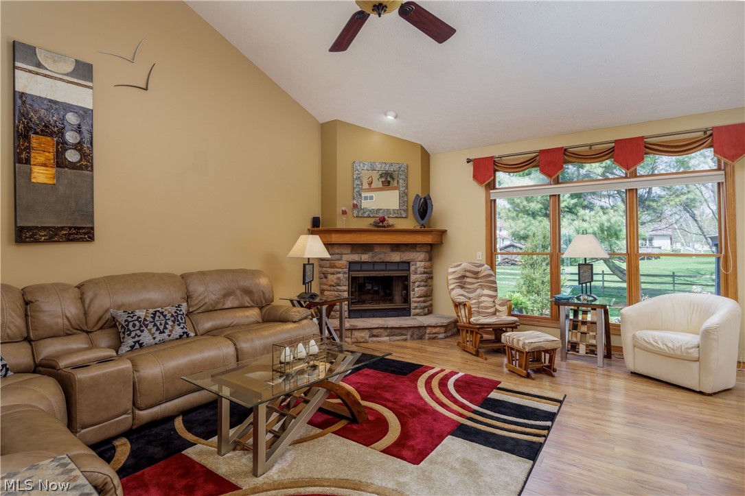 5671 Birmingham Road Northeast Canton, OH 44721 - Photo 3 of 26 Beautiful great room w/ laminate flooring and gas fireplace.